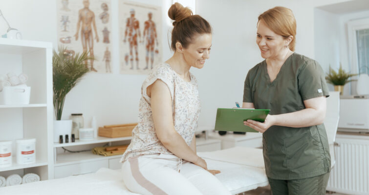 female holistic doctor talking about science based holistic medicine with patient