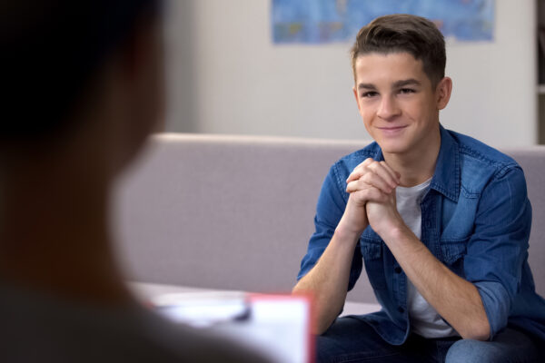 teenager visiting doctor during a pediatric mental health