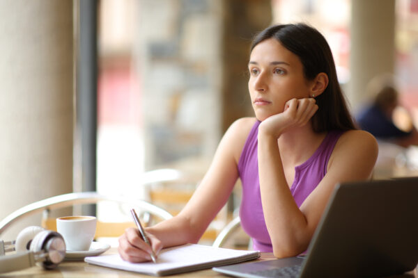 Woman dozing off, not focusing on the task at hand.