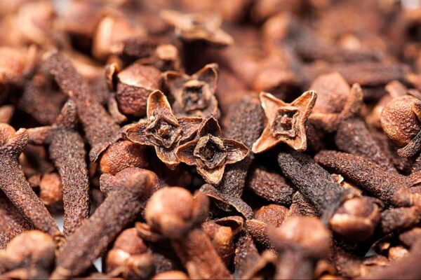 A close up of a large amount of cloves
