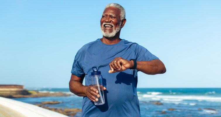 Older man looking enthusiastic and healthy - focusing on longevity.