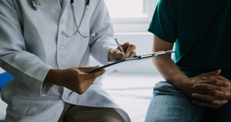 Male patient having consultation with doctor